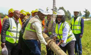 Principal Secretary for Energy, Mr. Alex Wachira (front left) pulling together with the REREC staff in a show of solidarity  to ensure every Kenyan Household is connected to electricity.