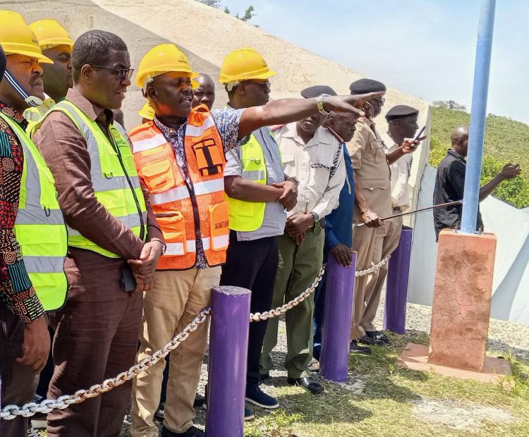 Cabinet Secretary for Energy and Petroleum Opiyo Wandayi (2nd Left) being shown arround the Sondu Miriu hydroelectric Power project, Kisumu County by Ken Gen official (gesturing). The Mr wandayi was on a familiarization tour of the facility.